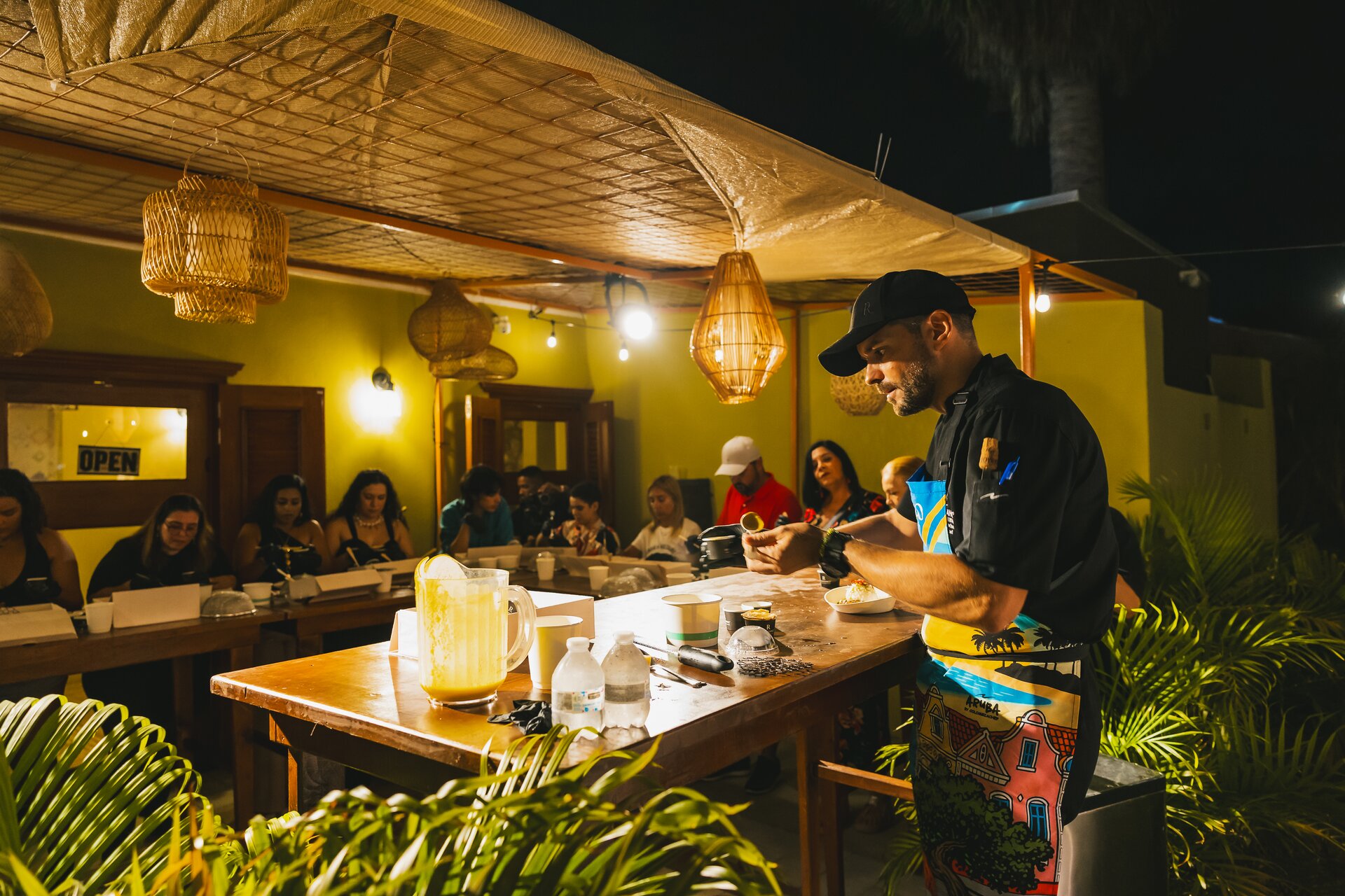 A chef leads a cooking demonstration at the Autentico Pavilion in Oranjestad, Aruba