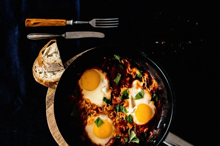 Shakshuka served in a cast-iron pan