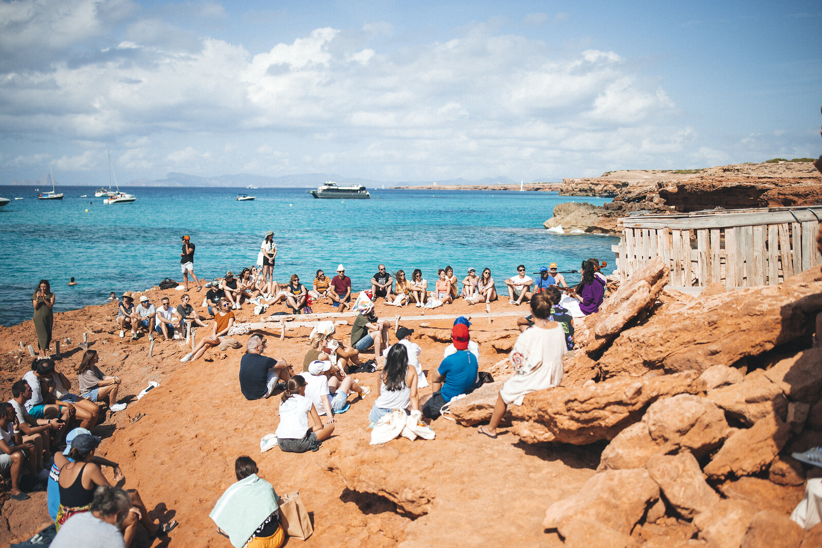 Festival-goers at a previous edition of SON Estrella Galicia Posidonia on the Formentera coast