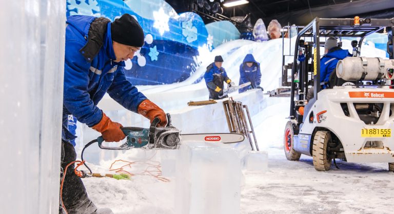 Artisan carving an ICE! Christmas sculpture for Marriott resorts