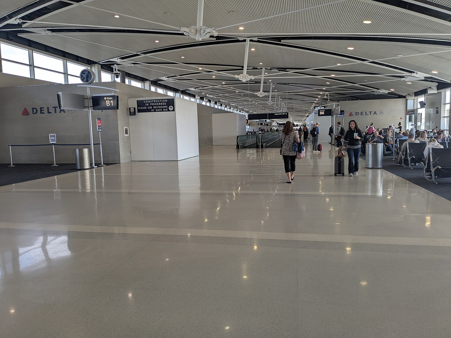 Airport concourse with passengers