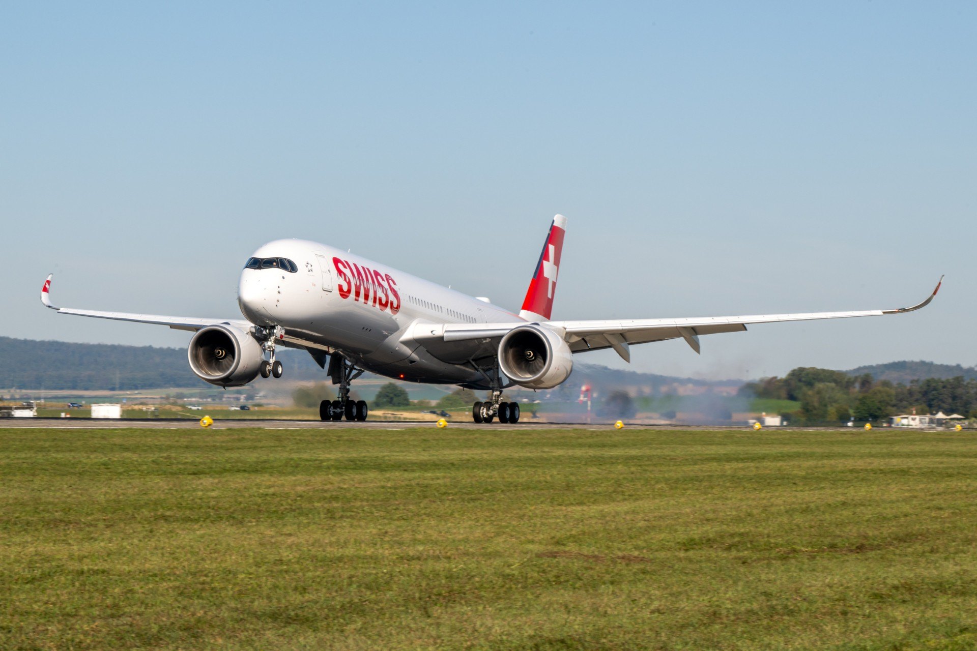 A SWISS Airbus A350 taking off at Zurich Airport